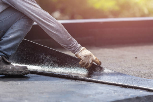 Professional Basement Waterproofing technician working in Farmington, IL